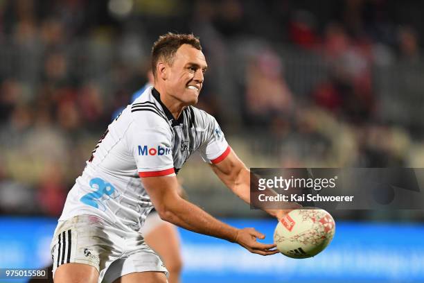 Israel Dagg of the Crusaders passes the ball during the match between the Crusaders and the French Barbarians at AMI Stadium on June 15, 2018 in...