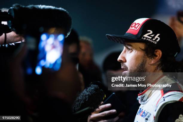 Fernando Alonso of Spain and Toyota Gazoo Racing with the media at thee end of qualifying session for the Le Mans 24 Hour Race on June 14, 2018 in Le...