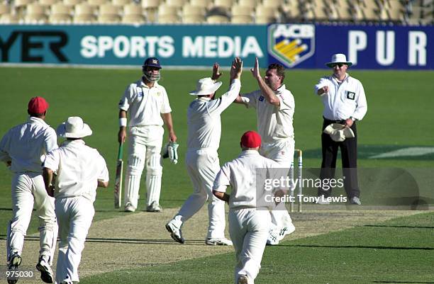 The South Australians celebrate as Brad Hodge is caught by Mark Harrity in the match between the South Australian Redbacks and the Victorian...