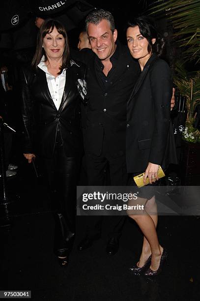 Anjelica Huston and Danny Huston arrive at the Chanel And Charles Finch Pre-Oscar Party Celebrating Fashion And Film at Madeo Restaurant on March 6,...