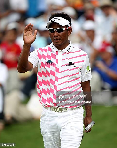 Thongchai Jaidee of Thailand waves to the crowd on the 18th hole during the final round of the Maybank Malaysia Open at the Kuala Lumpur Golf &...
