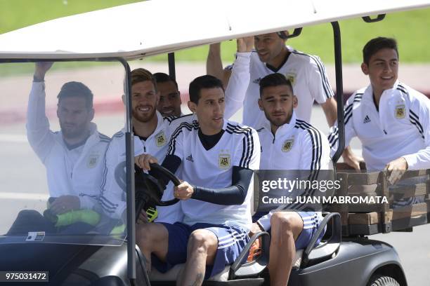 Argentina's forward Lionel Messi, defender Cristian Ansaldi, midfielder Angel Di Maria, and midfielder Eduardo Salvio and defender Gabriel Mercado,...