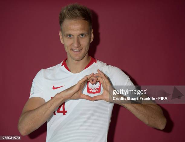 Lukasz Teodorczyk of Poland poses for a photograph during the official FIFA World Cup 2018 portrait session at on June 14, 2018 in Sochi, Russia.
