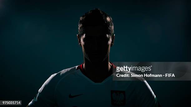Robert Lewandowski of Poland poses during the official FIFA World Cup 2018 portrait session at Hyatt Regency Hotel on June 14, 2018 in Sochi, Russia.
