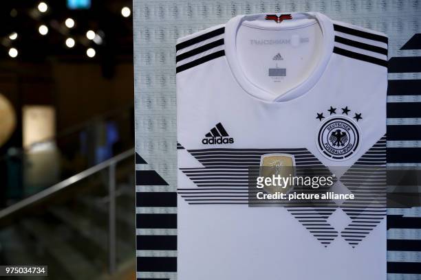 May 2018, Germany, Fuerth: The official jersey of Germany for the 2018 Soccer World Cup in Russia is on display as part of the annual general meeting...