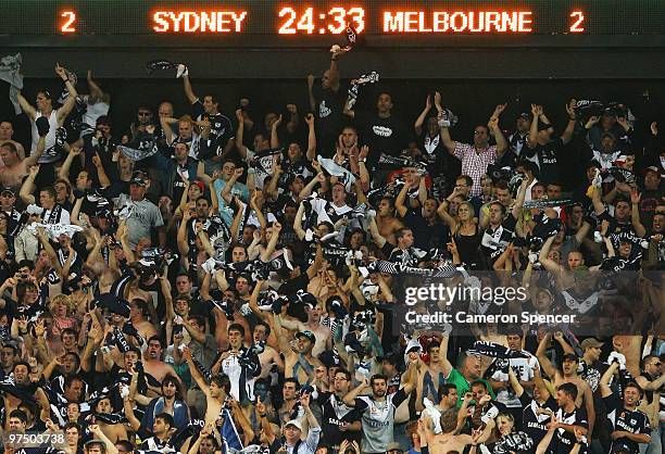 Victory fans celebrate a goal during the A-League Major Semi Final match between Sydney FC and Melbourne Victory at Sydney Football Stadium on March...