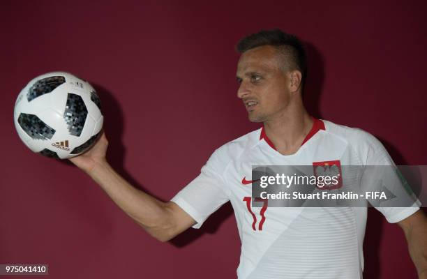 Slawomir Peszko of Poland poses for a photograph during the official FIFA World Cup 2018 portrait session at on June 14, 2018 in Sochi, Russia.