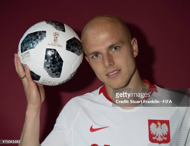Rafal Kurzawa of Poland poses for a photograph during the official FIFA World Cup 2018 portrait session at on June 14, 2018 in Sochi, Russia.