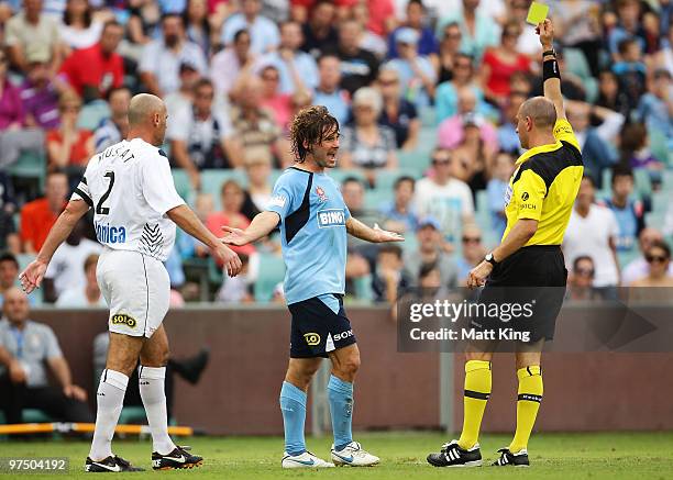 Karol Kisel of Sydney is given a yellow card during the A-League Major Semi Final match between Sydney FC and Melbourne Victory at Sydney Football...