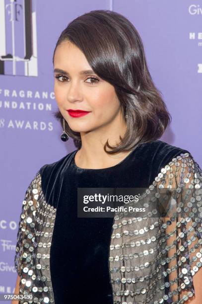 Nina Dobrev wearing dress by Dior attends 2018 Fragrance Foundation Awards at Alice Tully Hall at Lincoln Center.