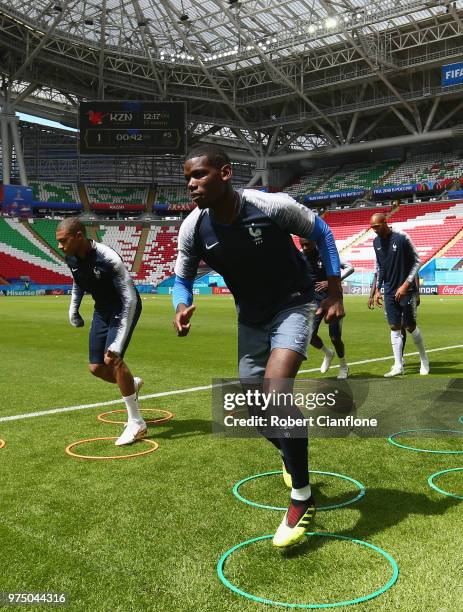 Paul Pogba of France warms up during the French team training session at Kazan Arena on June 15, 2018 in Kazan, Russia.