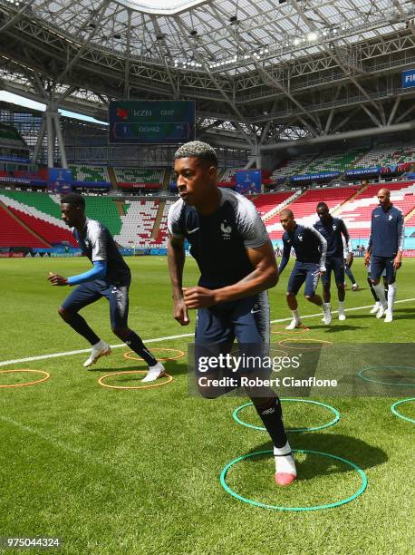 Presnel Kimpembe of France warms up during the French team training session at Kazan Arena on June 15, 2018 in Kazan, Russia.
