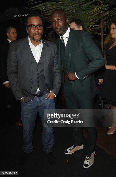 Lee Daniels and Designer Ozwald Boateng arrives at the Chanel And Charles Finch Pre-Oscar Party Celebrating Fashion And Film at Madeo Restaurant on...