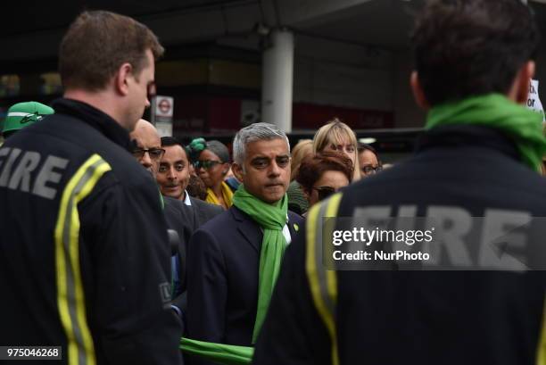 Mayor of London Sadiq Khan join a silent march to St Mark's Park where an open Iftar will take place on the one year anniversary of the Grenfell...