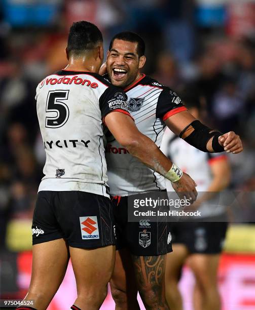 Adam Blair and Ken Maumalo of the Warriors celebrate after winning the round 15 NRL match between the North Queensland Cowboys and the New Zealand...