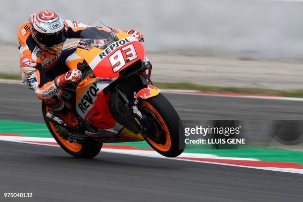 Repsol Honda's Spanish rider Marc Marquez rides during the Catalunya MotoGP Grand Prix first free practice session at the Catalunya racetrack in...