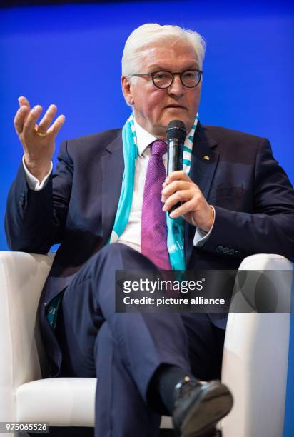 May 2018, Muenster, Germany: Federal President Frank-Walter Steinmeier speaks to the visitors during the panel discussion on "Peace through...