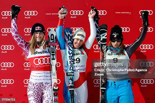 Dominique Gisin of Switzerland takes 1st place, Lindsey Vonn of the USA takes 2nd place, Julia Mancuso of the USA takes 3rd place during the Audi FIS...