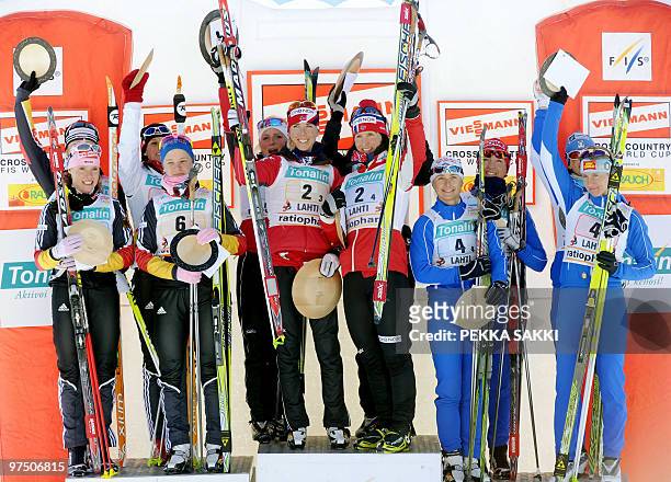 Second-placed Germany Evi Sachenbacher Stehle, Katrin Zeller, Nicole Fessel and Miriam Goessner, winners Norway I Therese Johaug, Kristin Steira,...