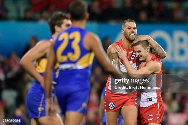 Ben Ronke of the Swans celebrates kicking a goal with Lance Franklin of the Swans during the round 13 AFL match between the Sydney Swans and the West...