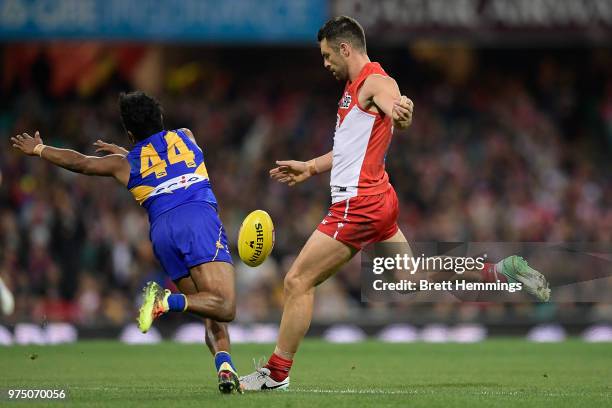 Heath Grundy of the Swans kicks the ball during the round 13 AFL match between the Sydney Swans and the West Coast Eagles at Sydney Cricket Ground on...