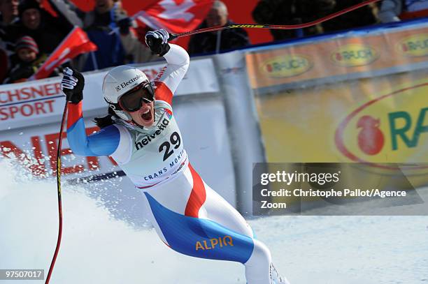 Dominique Gisin of Switzerland takes 1st place during the Audi FIS Alpine Ski World Cup Women's Super G on March 7, 2010 in Crans Montana,...