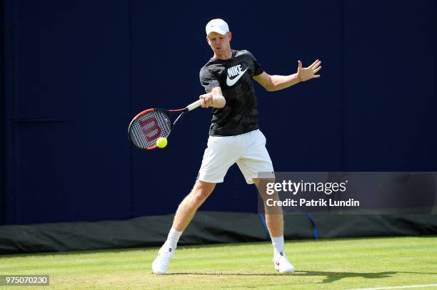 Kyle Edmund of Great Britain hits a forehand in practice during preview Day 3 of the Fever-Tree Championships at Queens Club on June 15, 2018 in...