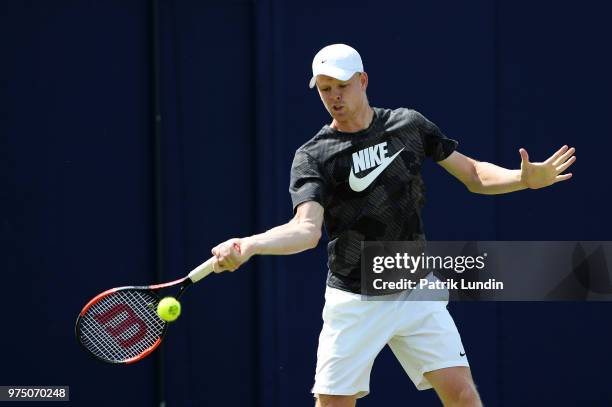 Kyle Edmund of Great Britain hits a forehand in practice during preview Day 3 of the Fever-Tree Championships at Queens Club on June 15, 2018 in...