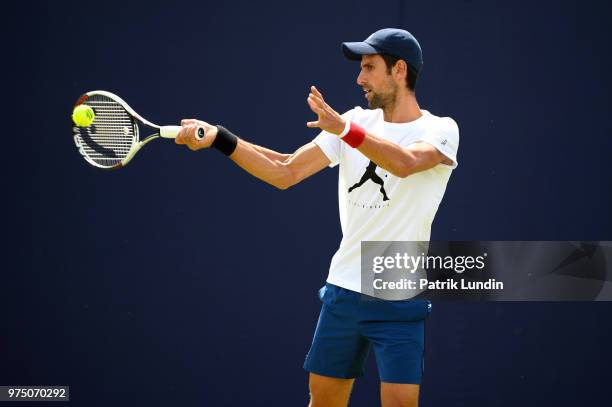 Novak Djokovic of Serbia hits a forehand in practice during preview Day 3 of the Fever-Tree Championships at Queens Club on June 15, 2018 in London,...