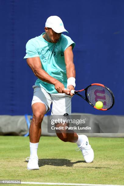 Jay Clarke of Great Britain hits a backhand in practice during preview Day 3 of the Fever-Tree Championships at Queens Club on June 15, 2018 in...