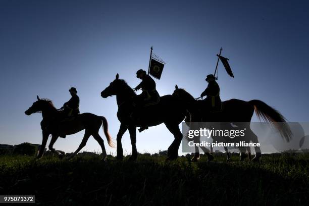 Dpatop - 11 May 2018, Germany, Weingarten: Participants of the traditional 'blood ride' celebrate Ascension Day in Europe's largest mounted...