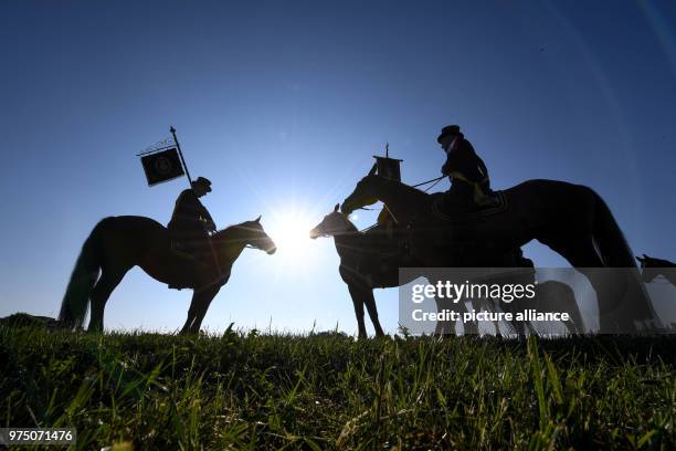 May 2018, Germany, Weingarten: Participants of the traditional 'blood ride' celebrate Ascension Day in Europe's largest mounted procession. Around...