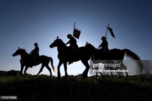 May 2018, Germany, Weingarten: Participants of the traditional 'blood ride' celebrate Ascension Day in Europe's largest mounted procession. Around...