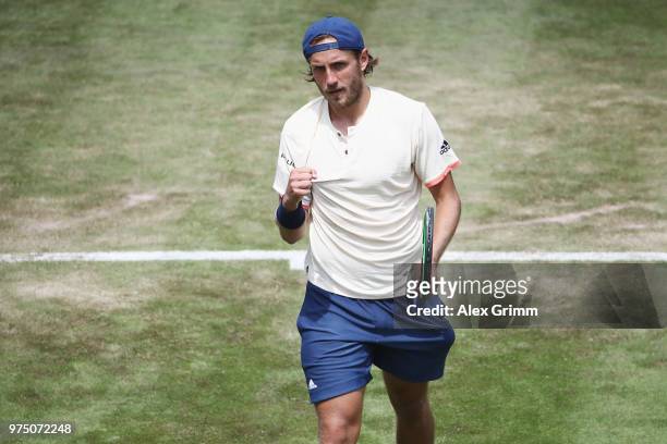 Lucas Pouille of France celebrates after winning his match against Denis Istomin of Uzbekistan during day 5 of the Mercedes Cup at Tennisclub...