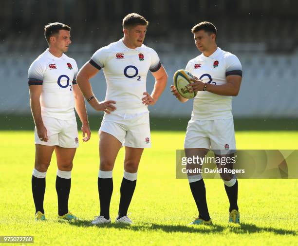 George Ford, Owen Farrell and Ben Youngs gather during the England training session at Kings Park Stadium on June 15, 2018 in Durban, South Africa.