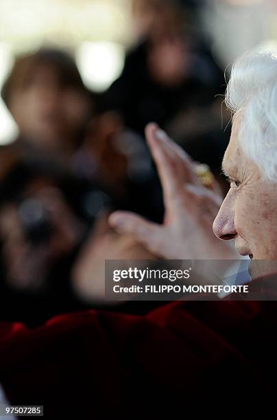 Pope Benedict XVI gestures towards the congregation during a visit to the San Giovanni della Croce Parish in Rome on March 7, 2010. AFP PHOTO /...