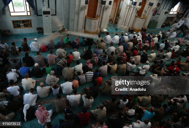 Syrian people perform Eid al-Fitr prayer at Ez Zehra Mosque in Al-Bab district of Aleppo, Syria on June 15, 2018. Turkey's Operation Euphrates...