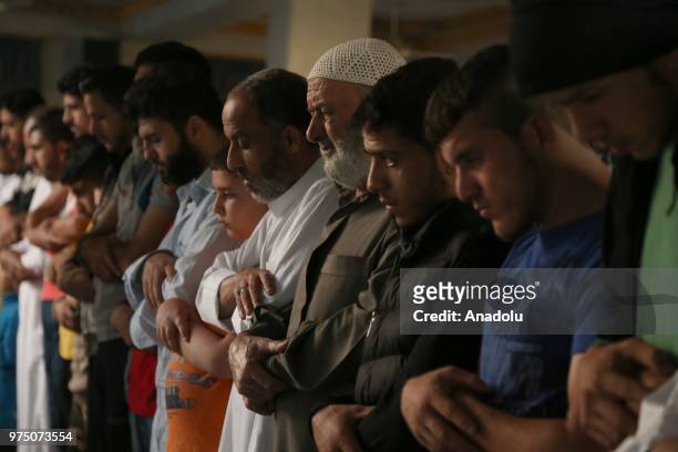 Syrian people perform Eid al-Fitr prayer at Ez Zehra Mosque in Al-Bab district of Aleppo, Syria on June 15, 2018. Turkey's Operation Euphrates...