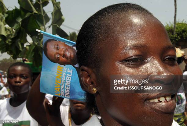 Supporter of Togolese incumbent President Faure Gnassingbe, son of the late veteran dictator Gnassingbe Eyadema, and candidate of the ruling Togolese...