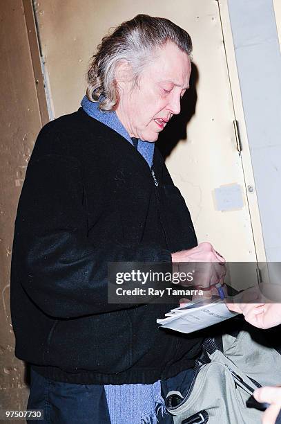 Actor Christopher Walken signs autographs outside the Gerald Schoenfeld Theater on March 06, 2010 in New York City.