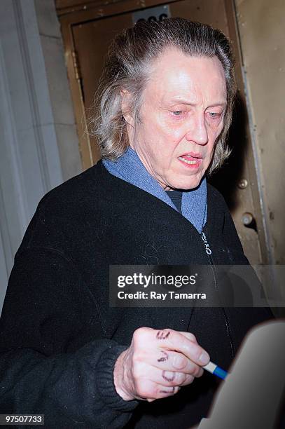 Actor Christopher Walken signs autographs outside the Gerald Schoenfeld Theater on March 06, 2010 in New York City.