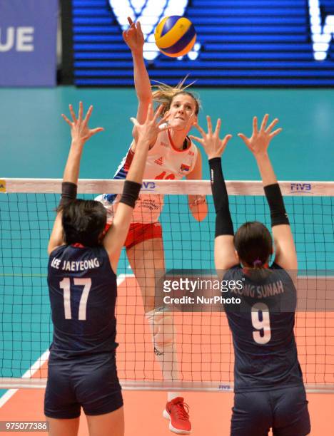 Of Serbia in action against JAEYEONG LEE and SUNAH JEONG of Korea during FIVB Volleyball Nations League match between Korea and Serbia at the Stadium...