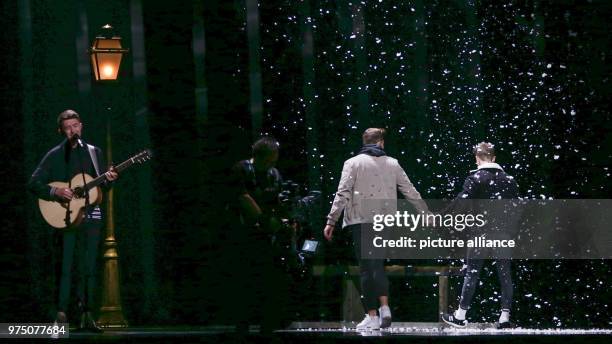 May 2018, Portugal, Lisbon: Irish dancers of Ryan O'Shaughnessy, hold hands during the 1st general rehearsal of the ESC finals. The final will take...