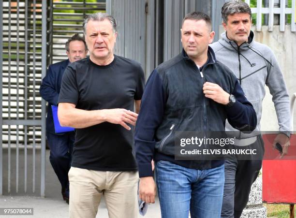 Manager of "Dinamo" football club, from Zagreb, Croatia, Zdravko Mamic accompanied by his brother Zoran Mamic and his attorney leave the building of...