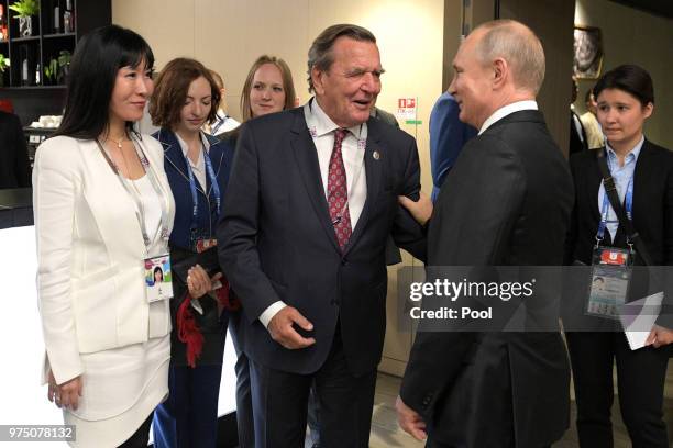 President Vladimir Putin, Gerhard Schroeder, Chairman of the Shareholders Committee with Nord Stream 2 AG and former German chancellor, and his wife...