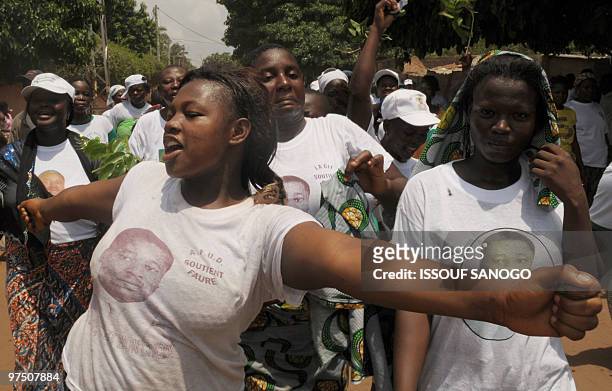 Supporters of Togolese incumbent President Faure Gnassingbe, son of the late veteran dictator Gnassingbe Eyadema, and candidate of the ruling...