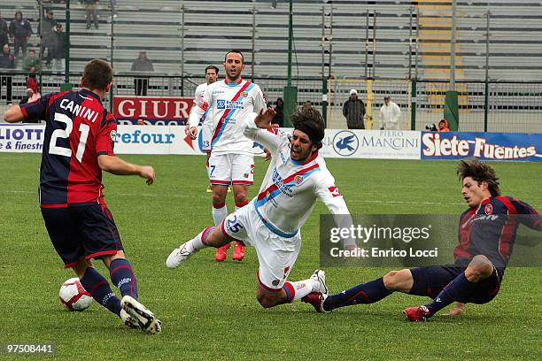 Nene and Michele Canini of Cagliari and Martinez Jose Andres of Catania during the Serie A match between Cagliari Calcio and Catania Calcio at Stadio...