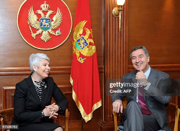 Montenegrin Prime Minister Milo Djukanovic and his Croatian counterpart Jadranka Kosor smile during their meeting in Montenegro's capital Podgorica...