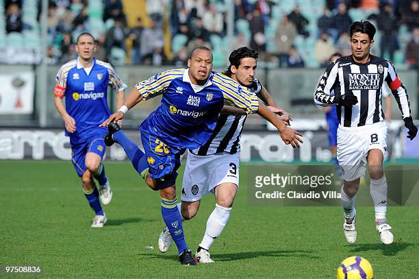 Cristiano Del Grosso of AC Siena competes for the ball with Jonathan Biabiany of Parma FC during the Serie A match between AC Siena and Parma FC at...