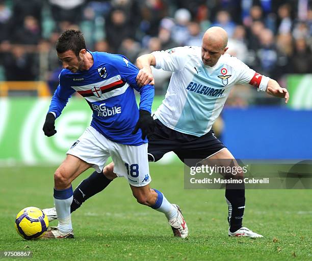 Stefano Guberti of UC Sampdoria battles for the ball against Tommaso Rocchi of SS Lazio during the Serie A match between UC Sampdoria and SS Lazio at...